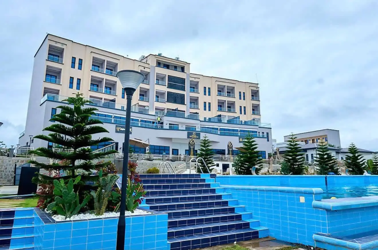 The blue-tiled steps leading from the pool up to the Golden K hotel façade